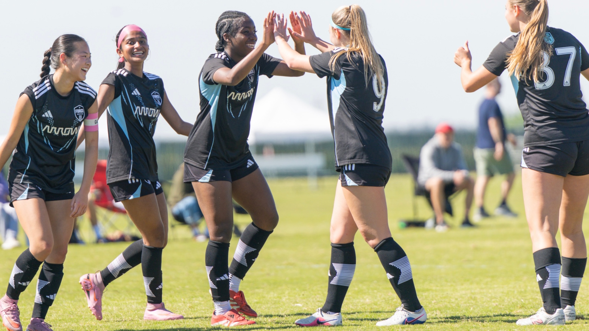 High-five with teammates